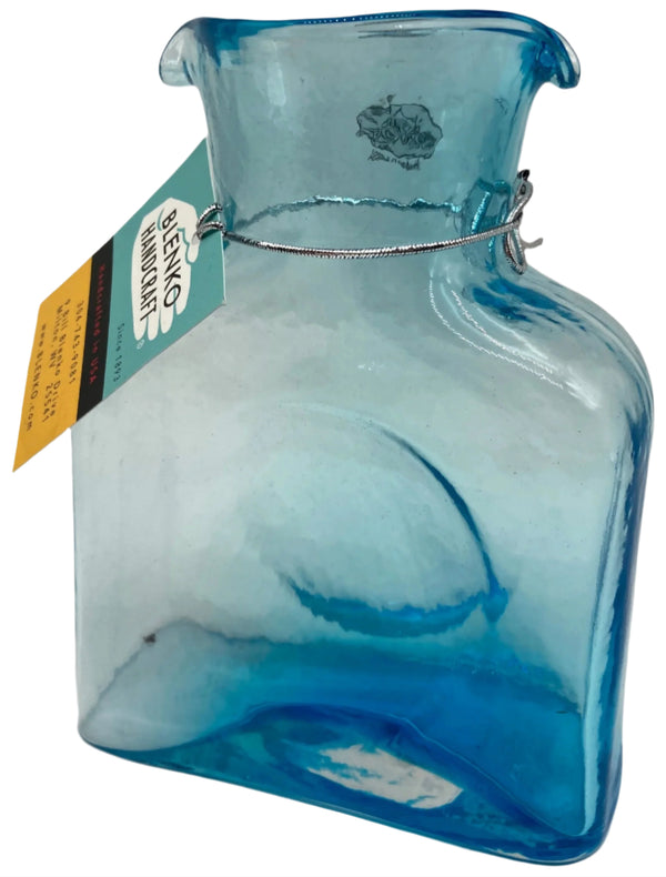 An ice blue mini glass water bottle.